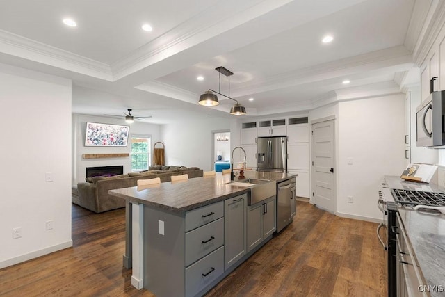 2178 Conley Rd, Sullivan, NY 13037 - kitchen featuring stainless steel appliances, gray cabinets, ornamental molding, a ceiling fan, and dark wood-style flooring