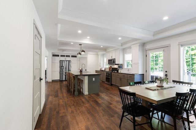 2178 Conley Rd, Sullivan, NY 13037 - dining room with dark wood-style flooring, ornamental molding, a raised ceiling, and recessed lighting