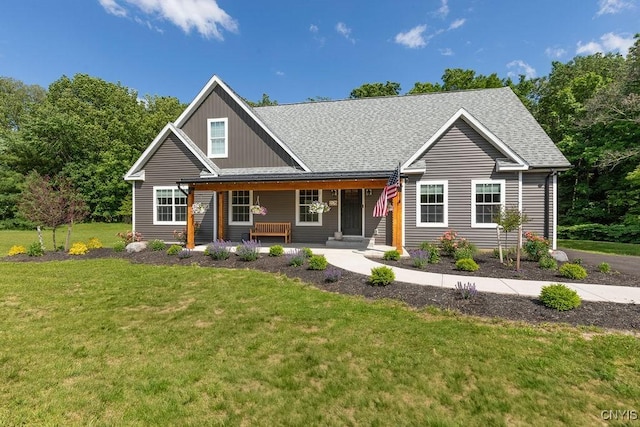2178 Conley Rd, Sullivan, NY 13037 - view of front facade with a shingled roof, a front yard, and a porch
