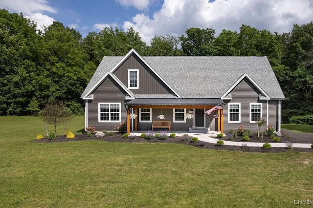 2178 Conley Rd, Sullivan, NY 13037 - view of front of property with roof with shingles, a front yard, a porch, and board and batten siding