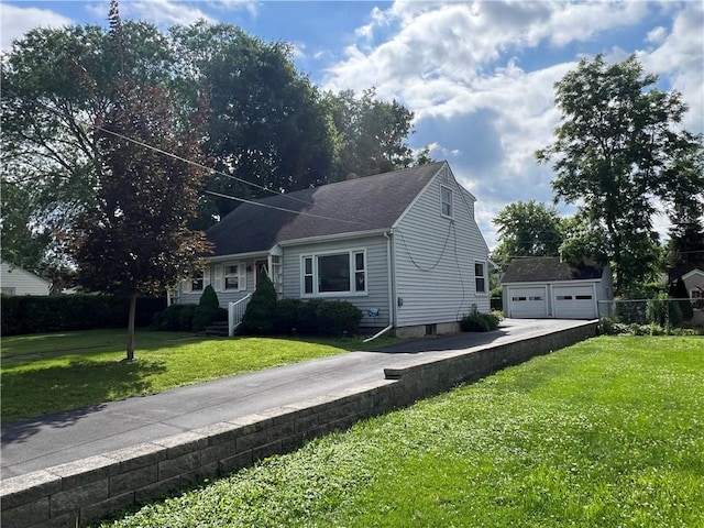 100 Curren Dr, Elmira, NY 14905 - view of front facade with a front yard, a detached garage, and an outdoor structure