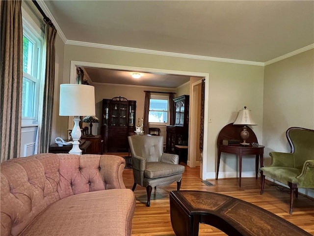 100 Curren Dr, Elmira, NY 14905 - living area with light wood-style floors and ornamental molding