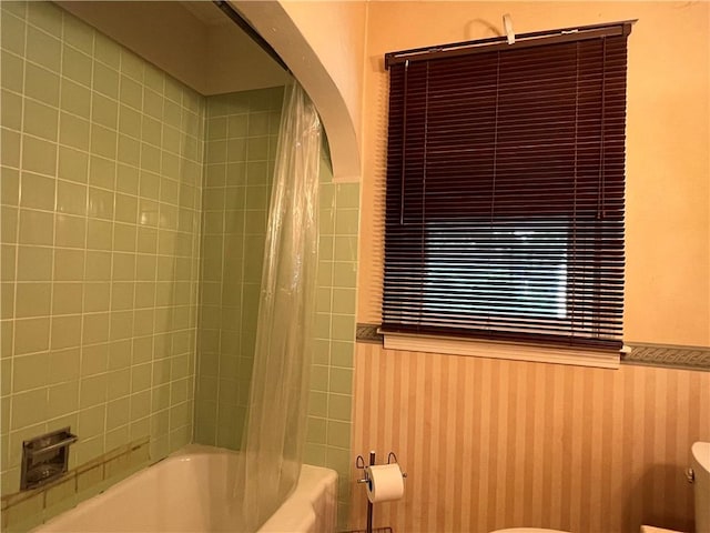 100 Curren Dr, Elmira, NY 14905 - bathroom with a wainscoted wall and shower / bathtub combination with curtain