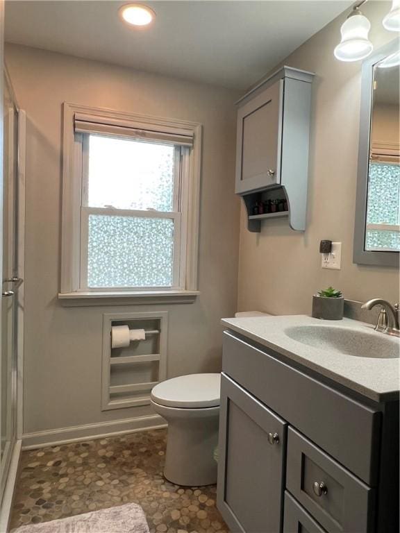 100 Curren Dr, Elmira, NY 14905 - bathroom featuring vanity, a shower with door, and recessed lighting