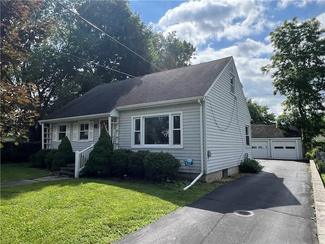 100 Curren Dr, Elmira, NY 14905 - view of front facade with a garage, a front yard, an outbuilding, and roof with shingles