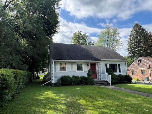 100 Curren Dr, Elmira, NY 14905 - view of front of home featuring a front lawn and a chimney