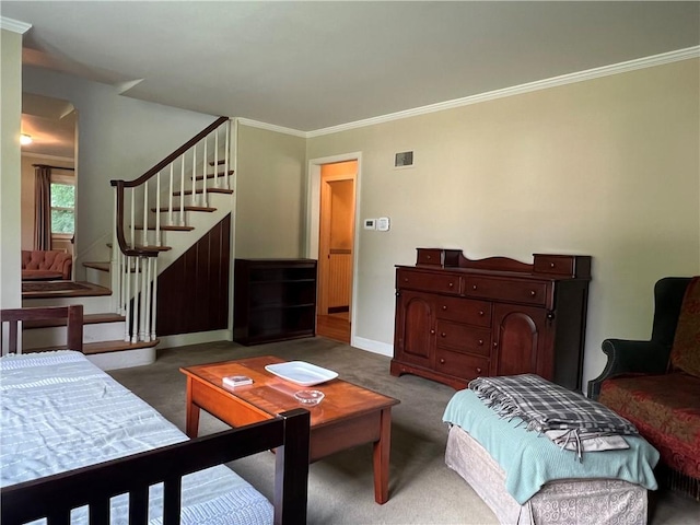 100 Curren Dr, Elmira, NY 14905 - carpeted living area featuring crown molding and stairway