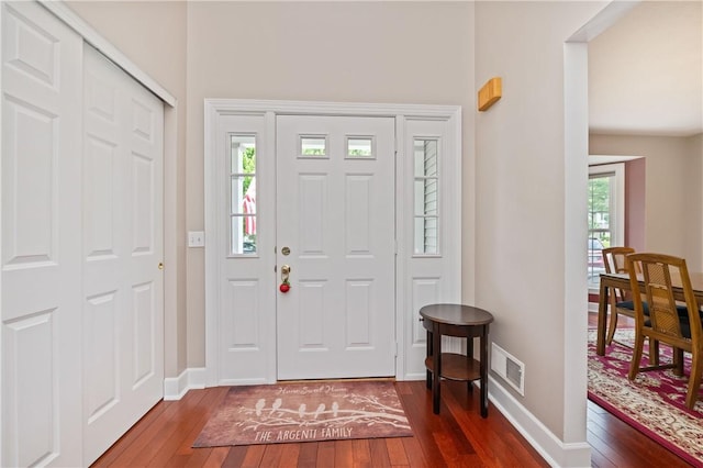 203 Torrey Pine Dr, Greece, NY 14612 - entryway featuring hardwood / wood-style flooring and baseboards
