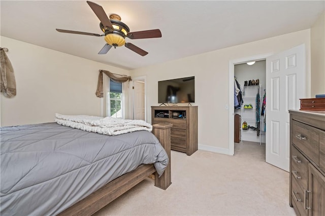 203 Torrey Pine Dr, Greece, NY 14612 - bedroom with a spacious closet, light carpet, a ceiling fan, and a closet