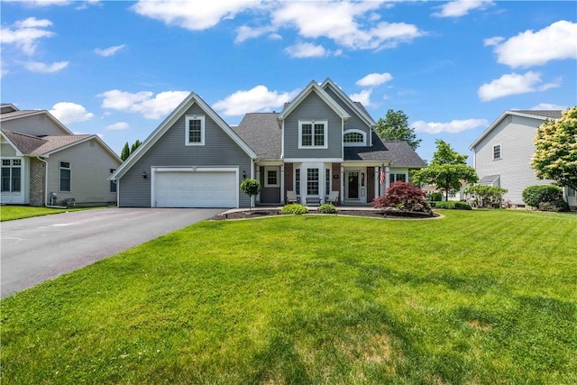 203 Torrey Pine Dr, Greece, NY 14612 - view of front of property featuring driveway, a garage, and a front lawn