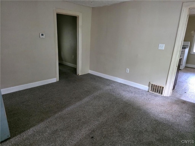 1026 Hess Ln, Utica, NY 13502 - carpeted empty room with baseboards