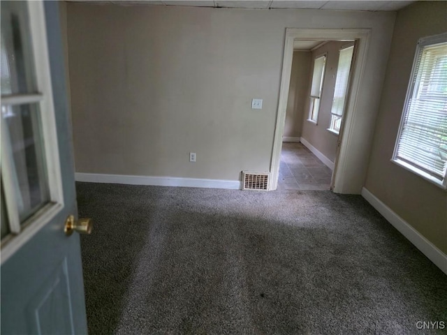 1026 Hess Ln, Utica, NY 13502 - unfurnished room featuring carpet flooring and baseboards