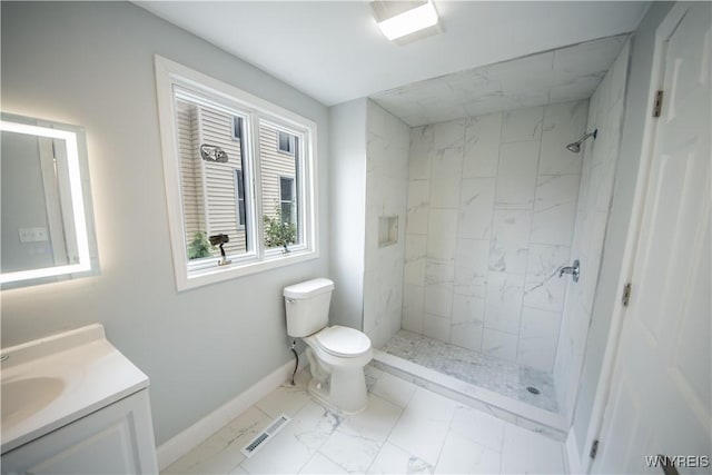 187 Lock St, Lockport-City, NY 14094 - bathroom with marble finish floors, vanity, and a marble finish shower