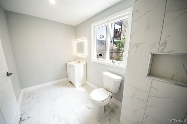 187 Lock St, Lockport-City, NY 14094 - bathroom featuring vanity and marble look tiles