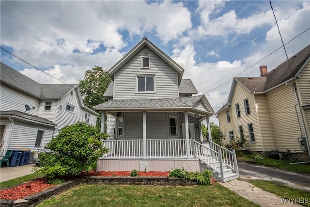 187 Lock St, Lockport-City, NY 14094 - view of front of home featuring a porch and roof with shingles