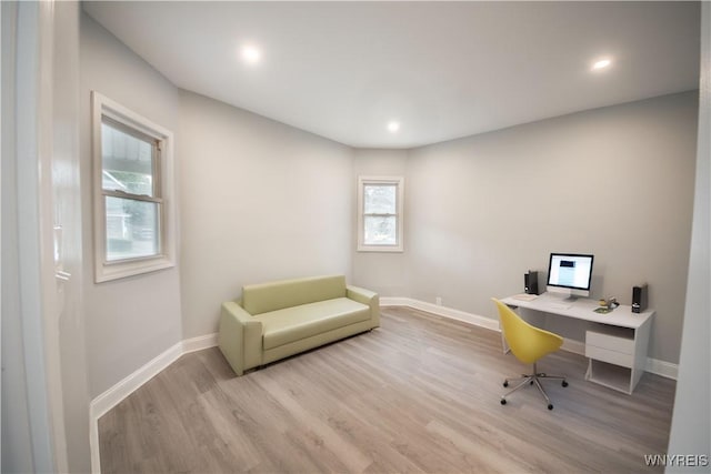 187 Lock St, Lockport-City, NY 14094 - home office featuring wood finished floors and recessed lighting