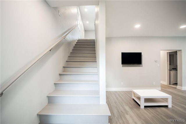 187 Lock St, Lockport-City, NY 14094 - stairway featuring wood finished floors and recessed lighting
