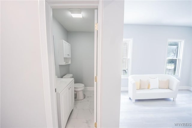 187 Lock St, Lockport-City, NY 14094 - bathroom featuring vanity and marble finish floors