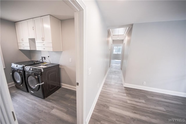 187 Lock St, Lockport-City, NY 14094 - washroom with attic access, washer and dryer, cabinet space, and wood finished floors