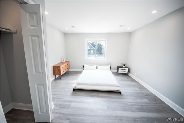 187 Lock St, Lockport-City, NY 14094 - bedroom with wood finished floors and recessed lighting