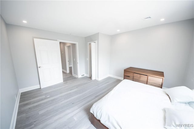187 Lock St, Lockport-City, NY 14094 - bedroom with wood finished floors and recessed lighting