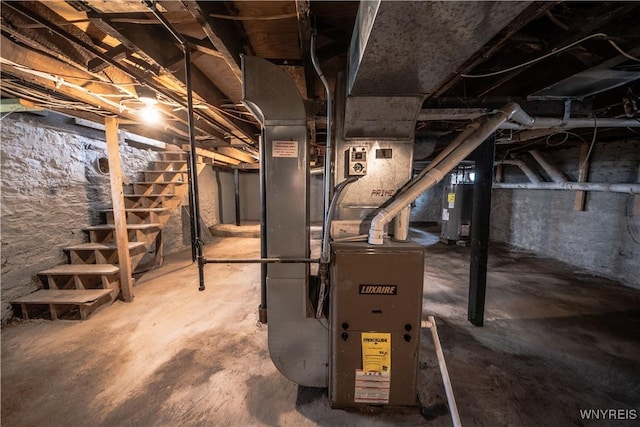 187 Lock St, Lockport-City, NY 14094 - unfinished basement with electric water heater and heating unit