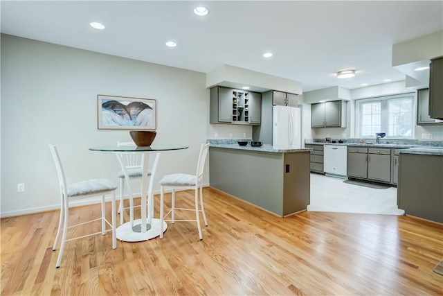 40 Little Glen Rd, Henrietta, NY 14534 - kitchen with gray cabinets, white appliances, a peninsula, light wood-style floors, and recessed lighting