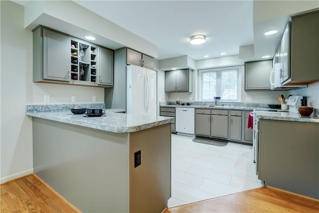 40 Little Glen Rd, Henrietta, NY 14534 - kitchen with gray cabinets, white appliances, a peninsula, open shelves, and recessed lighting
