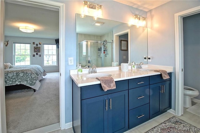 5472 Sycamore Ln, Hamburg, NY 14075 - ensuite bathroom featuring double vanity, a stall shower, and tile patterned floors