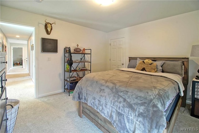 5472 Sycamore Ln, Hamburg, NY 14075 - bedroom featuring light carpet and baseboards
