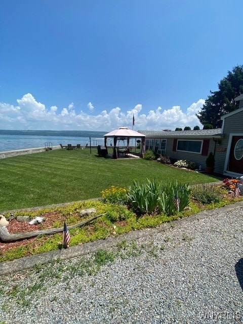 4192 Upson Point Rd, Starkey, NY 14837 - view of green lawn with a water view and a gazebo