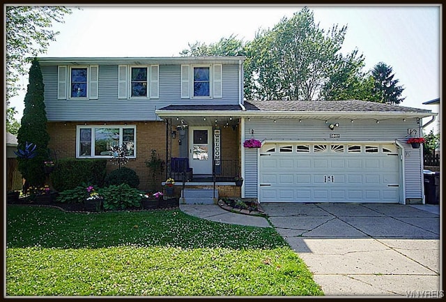 3042 Baseline Rd, Grand Island, NY 14072 - traditional-style house featuring an attached garage, driveway, a front lawn, and brick siding