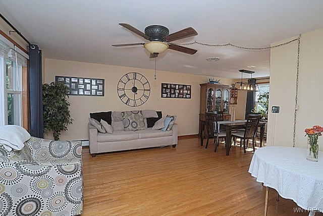 3042 Baseline Rd, Grand Island, NY 14072 - living area featuring light wood-type flooring and ceiling fan