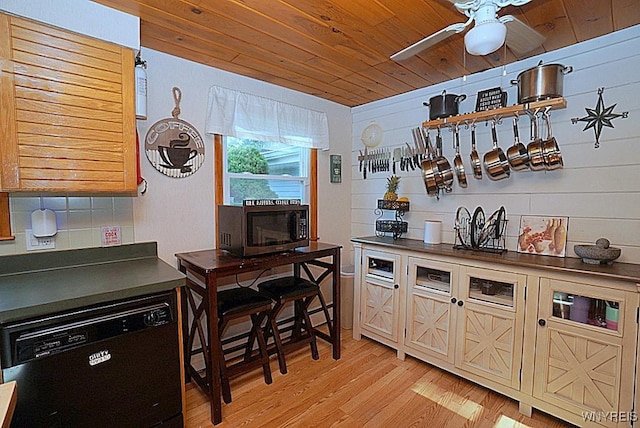 3042 Baseline Rd, Grand Island, NY 14072 - bar with black dishwasher, stainless steel microwave, light wood-style floors, a ceiling fan, and decorative backsplash