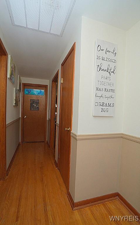 3042 Baseline Rd, Grand Island, NY 14072 - hall with light wood-style floors and baseboards