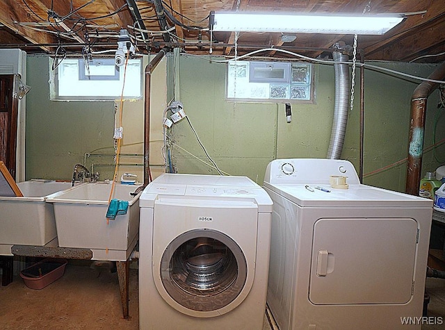 3042 Baseline Rd, Grand Island, NY 14072 - washroom with washer and clothes dryer and plenty of natural light