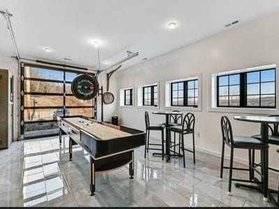 11059 Gold Seal Way, Urbana, NY 14840 - game room featuring marble finish floors