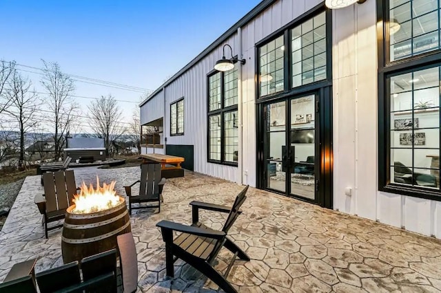 11059 Gold Seal Way, Urbana, NY 14840 - view of patio featuring a fire pit, a hot tub, grilling area, and french doors