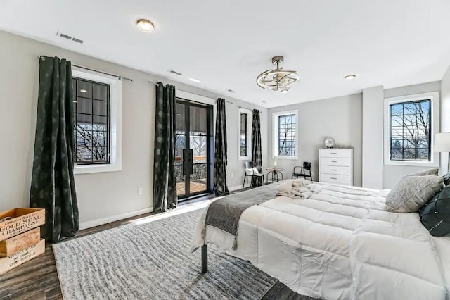 11059 Gold Seal Way, Urbana, NY 14840 - bedroom featuring access to outside, dark wood-style floors, and french doors