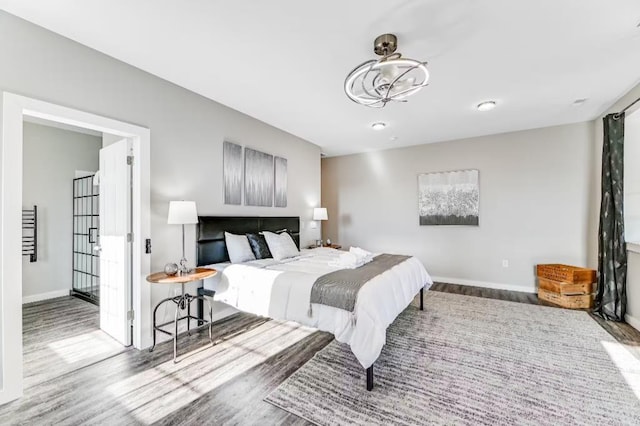 11059 Gold Seal Way, Urbana, NY 14840 - bedroom featuring wood finished floors and baseboards