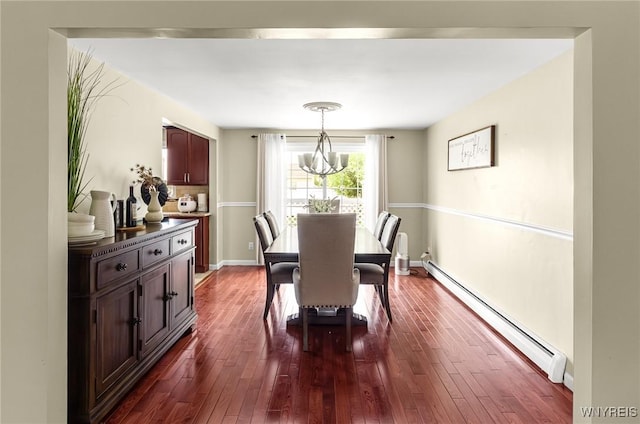 79 Hemlock Dr, West Seneca, NY 14224 - dining room featuring a baseboard radiator, dark wood-type flooring, and a chandelier