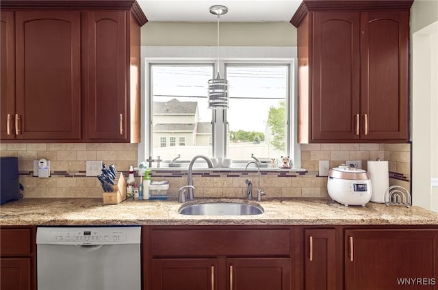 79 Hemlock Dr, West Seneca, NY 14224 - kitchen with dishwasher, backsplash, and light stone counters
