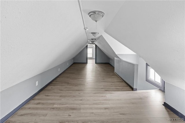 540 17th St, Niagara Falls, NY 14301 - bonus room featuring vaulted ceiling and wood finished floors