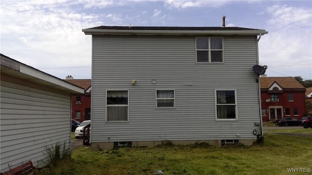 69 Holbrook St, Lackawanna, NY 14218 - rear view of house with a lawn