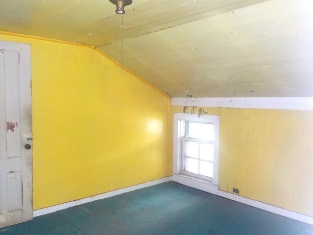 1140 N Main St, Arcadia, NY 14513 - additional living space with vaulted ceiling and baseboards