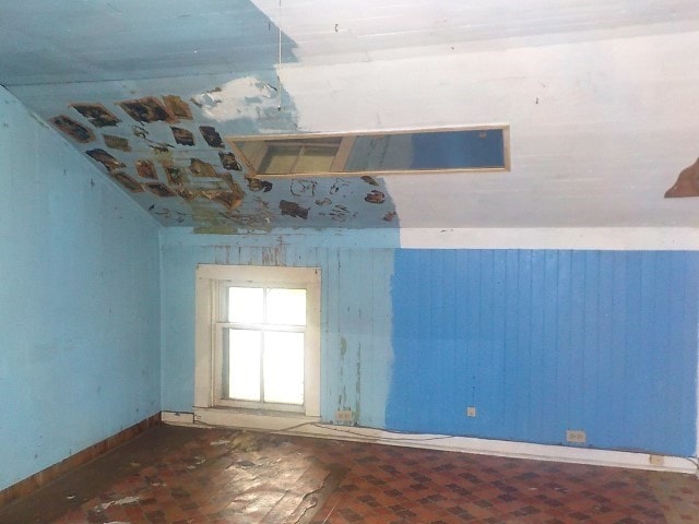 1140 N Main St, Arcadia, NY 14513 - empty room featuring wood walls