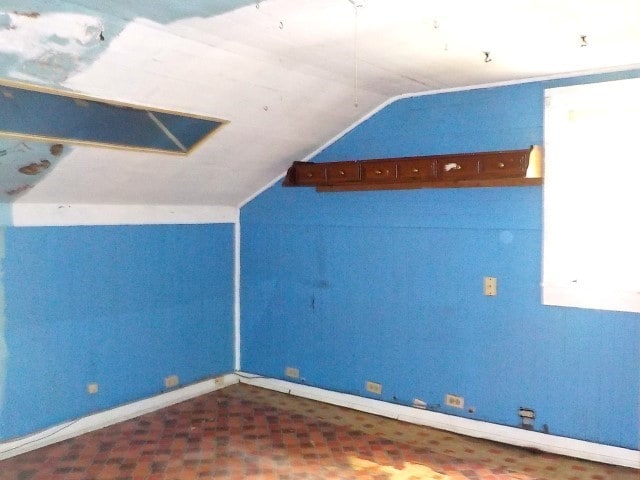1140 N Main St, Arcadia, NY 14513 - additional living space featuring vaulted ceiling and baseboards