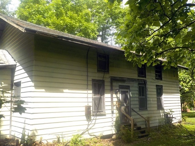 1140 N Main St, Arcadia, NY 14513 - rear view of property featuring entry steps