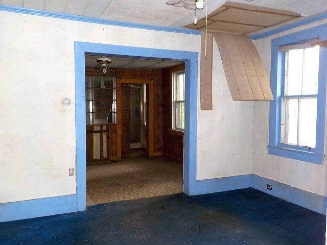 1140 N Main St, Arcadia, NY 14513 - hallway with plenty of natural light and unfinished concrete floors