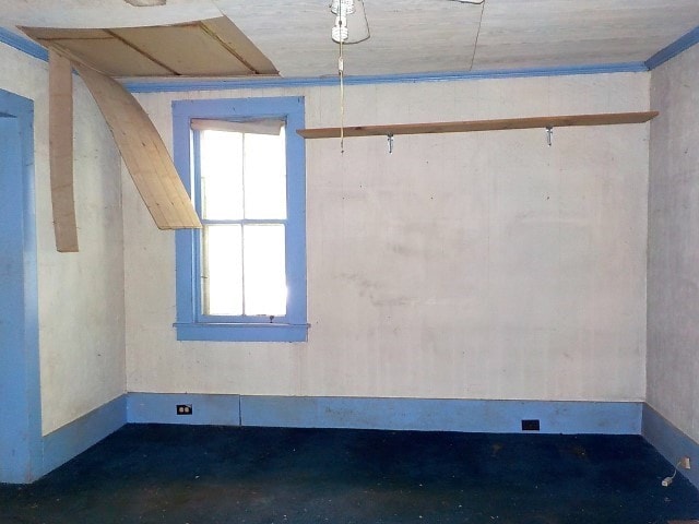 1140 N Main St, Arcadia, NY 14513 - empty room featuring concrete flooring and plenty of natural light